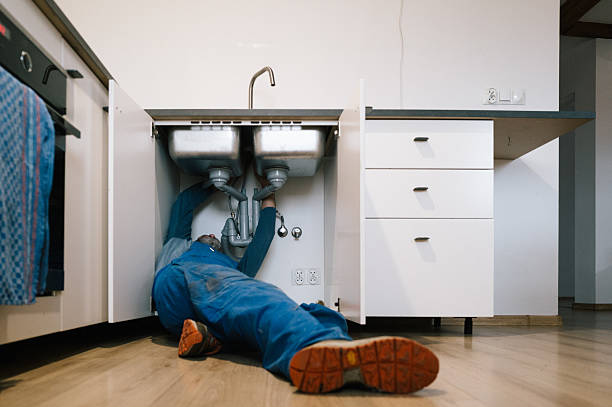 Professional Emergency Plumber technician working in Newfolden, MN